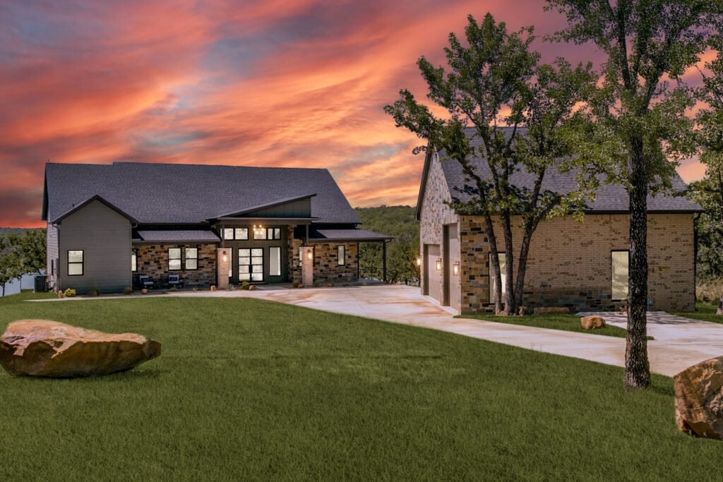 The Gathering House front entrance and detached garage at sunset