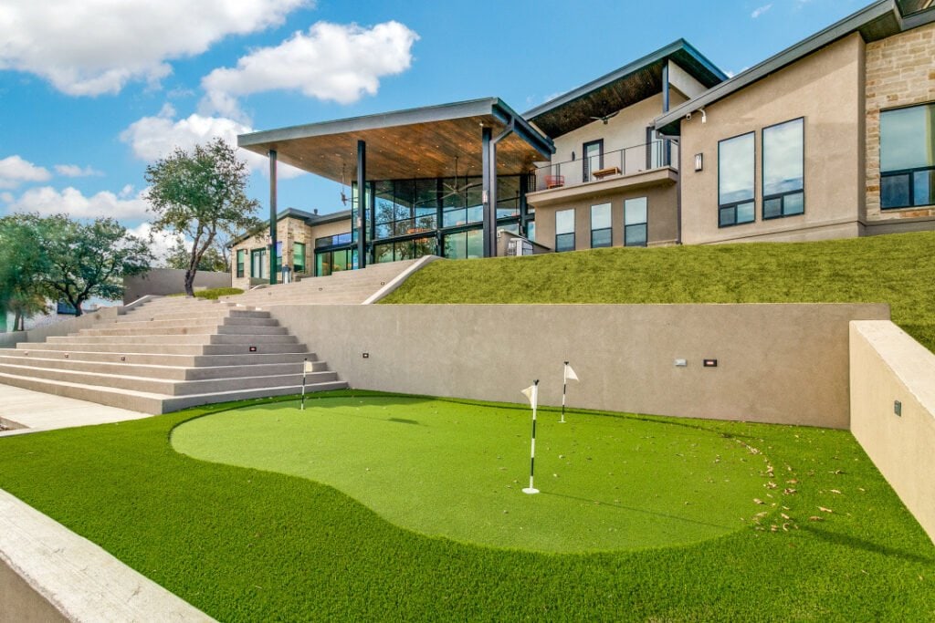 Modern North Texas custom home with a private putting green