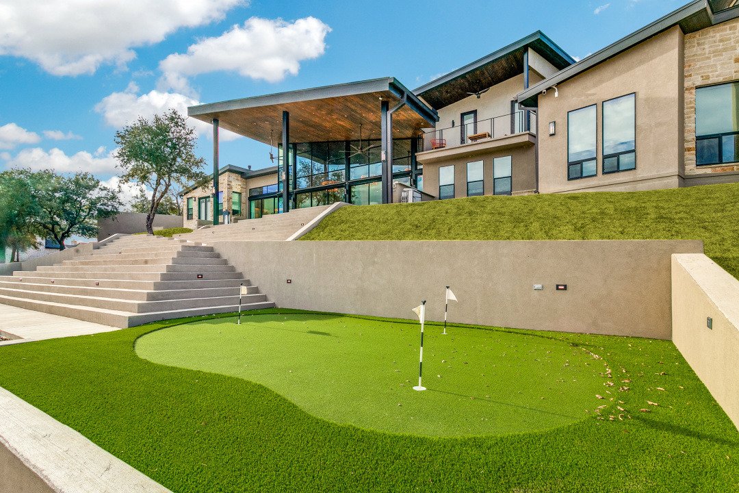 Outdoor living and private putting green at El Regalo