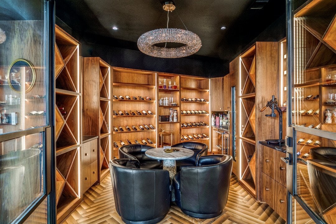 Wine and cigar room at El Regalo custom lake home in Chico, Texas